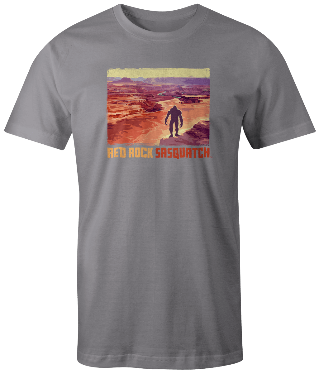 Grey short-sleeve t-shirt displaying a Sasquatch within the iconic vistas of Canyonlands National Park.