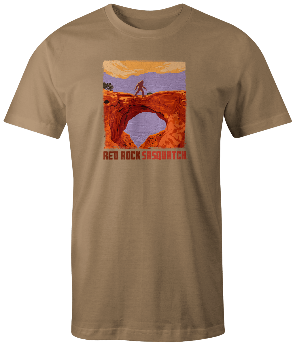Khaki short-sleeve tee featuring a Sasquatch graphic on a natural arch within Capitol Reef.