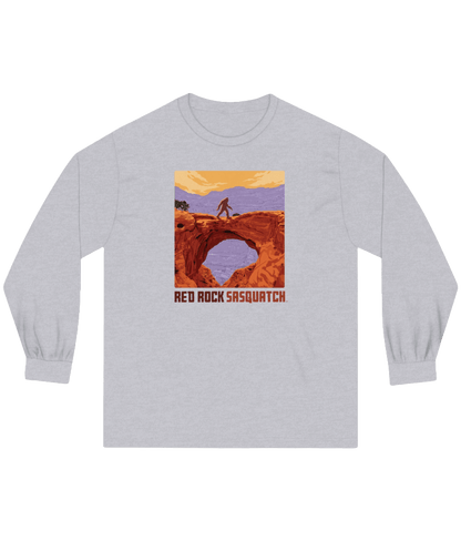 Athletic Heather Capitol Reef Long-Sleeve Tee. Features a Sasquatch figure on a natural bridge in Capitol Reef National Park.