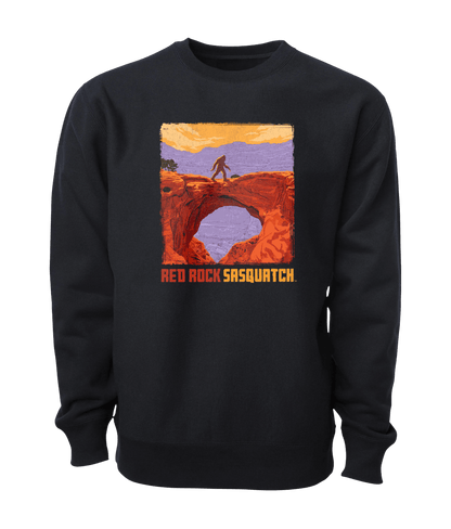 Black Capitol Reef crewneck sweatshirt featuring a graphic of a Sasquatch standing on a natural bridge in Capitol Reef National Park.