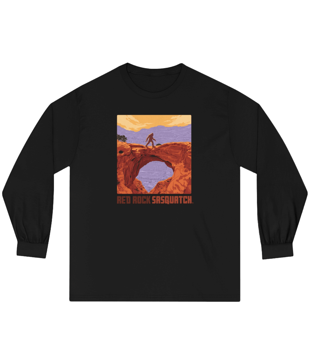Black Capitol Reef Long-Sleeve Tee. Showcases a unique design of Sasquatch standing on a rock arch in Capitol Reef.