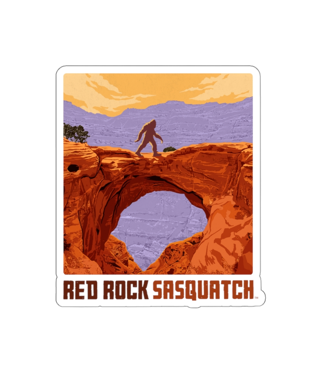 Capitol Reef die-cut sticker. Features a Sasquatch figure standing on a natural bridge overlooking Capitol Reef's landscape. A unique sticker for fans of Utah's national parks and the legendary Sasquatch.
