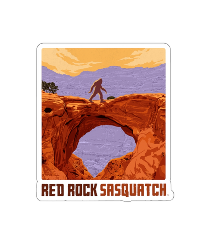 Capitol Reef die-cut sticker. Features a Sasquatch figure standing on a natural bridge overlooking Capitol Reef's landscape. A unique sticker for fans of Utah's national parks and the legendary Sasquatch.