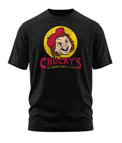 Front view of the black Chucky's Rest Stop Unisex T-Shirt from Shirts Of Legend. The graphic is a funny horror movie parody of the Buc-ee's logo, featuring a distressed illustration of Chucky's face in a red hat inside a yellow circle with the text "Chucky's Ultimate Rest Stop."