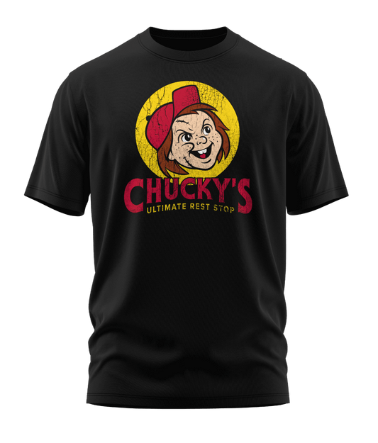Front view of the black Chucky's Rest Stop Unisex T-Shirt from Shirts Of Legend. The graphic is a funny horror movie parody of the Buc-ee's logo, featuring a distressed illustration of Chucky's face in a red hat inside a yellow circle with the text "Chucky's Ultimate Rest Stop."