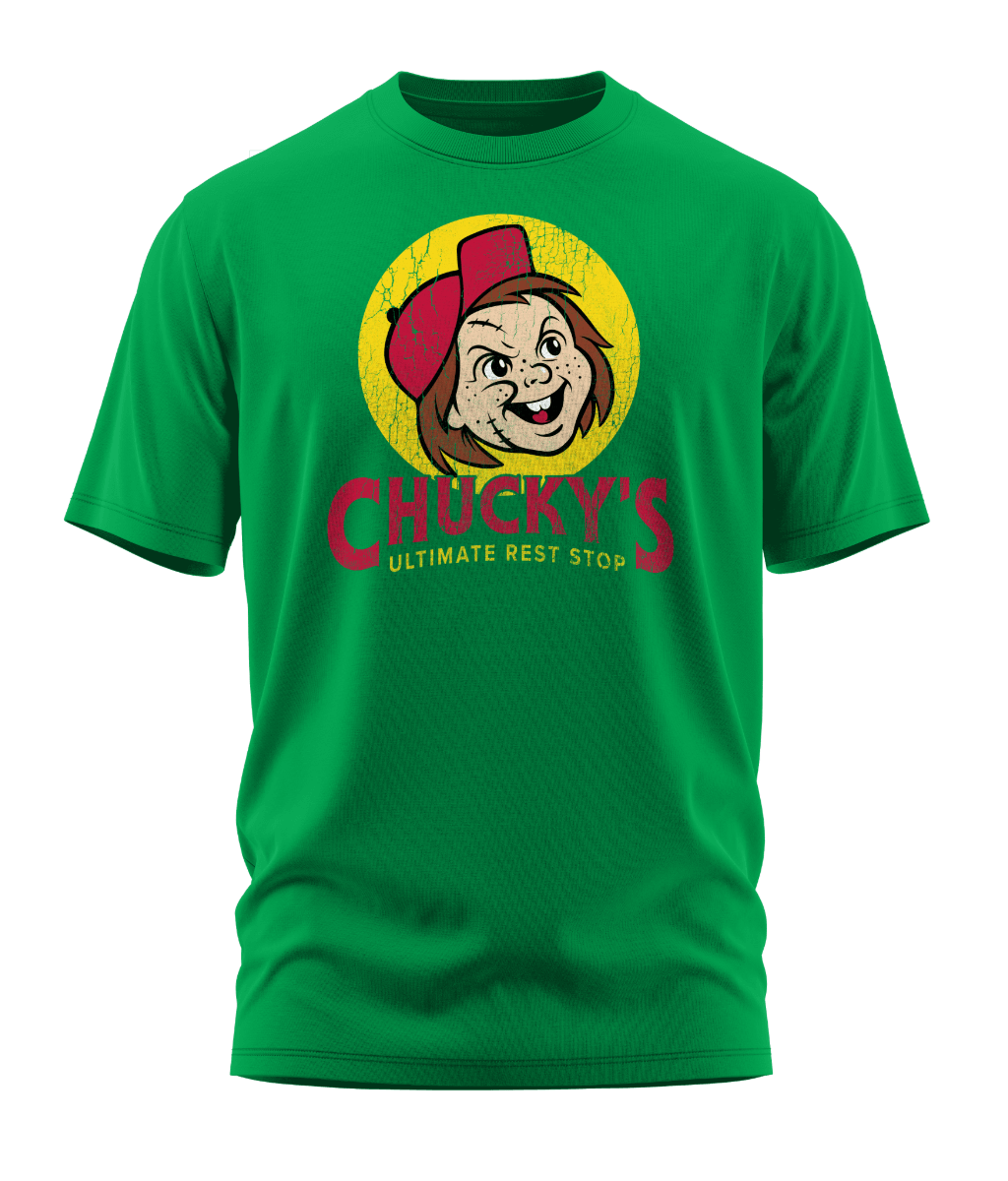 Front view of the kelly green Chucky's Rest Stop Unisex T-Shirt from Shirts Of Legend. The graphic is a funny horror movie parody of the Buc-ee's logo, featuring a distressed illustration of Chucky's face in a red hat inside a yellow circle with the text "Chucky's Ultimate Rest Stop."