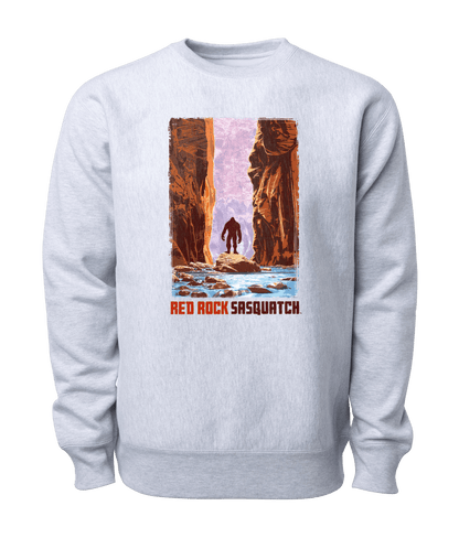 Heather grey Zion crewneck sweatshirt. Features a graphic of a Sasquatch standing in The Narrows, a scenic canyon in Zion National Park.