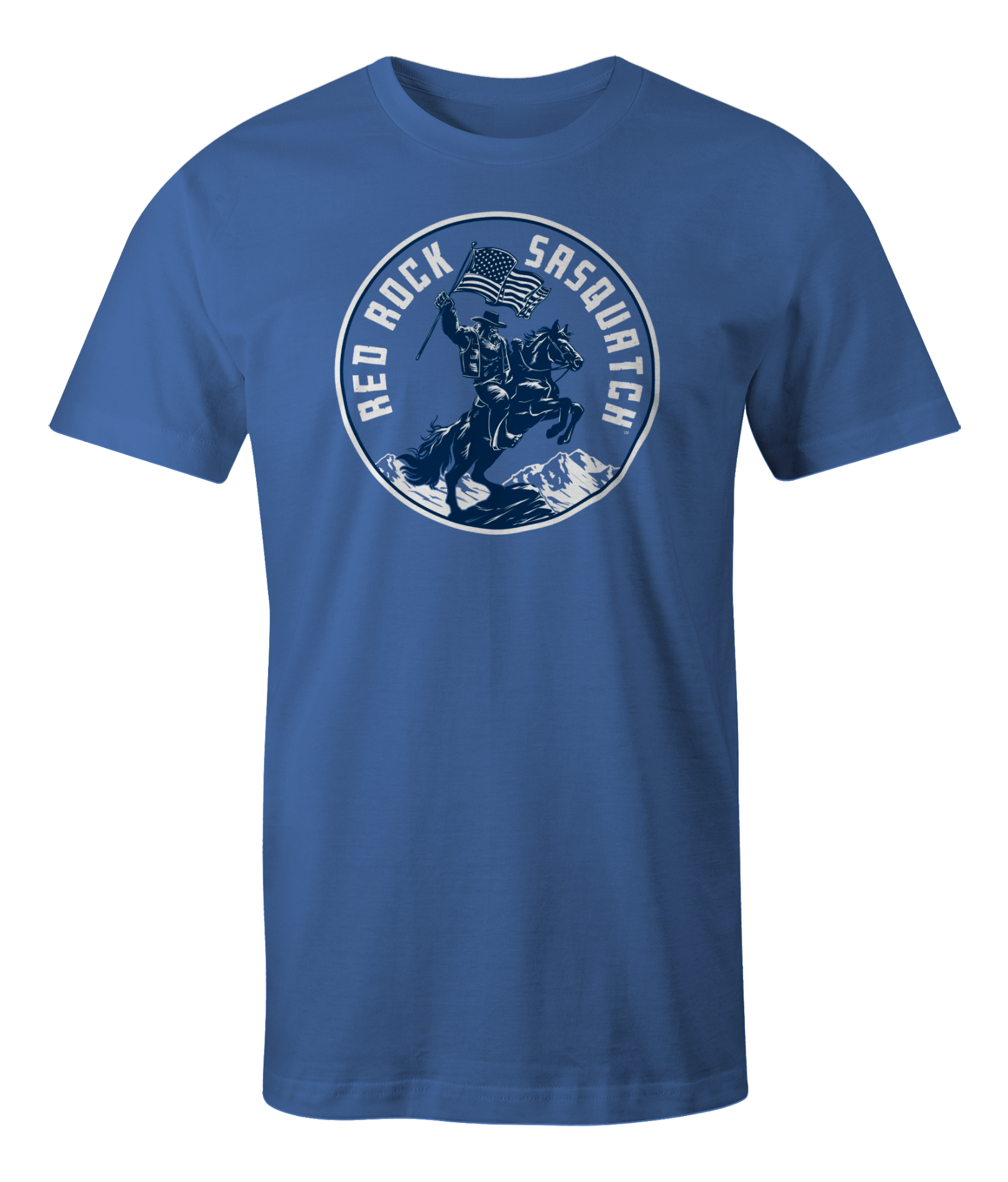 Mystic Blue Squatchrider t-shirt with white text. Features Sasquatch riding a horse and waving an American flag. A bold and patriotic design.