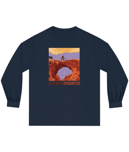Navy Capitol Reef Long-Sleeve Tee. Depicts a Sasquatch silhouette overlooking a canyon arch in Capitol Reef National Park.