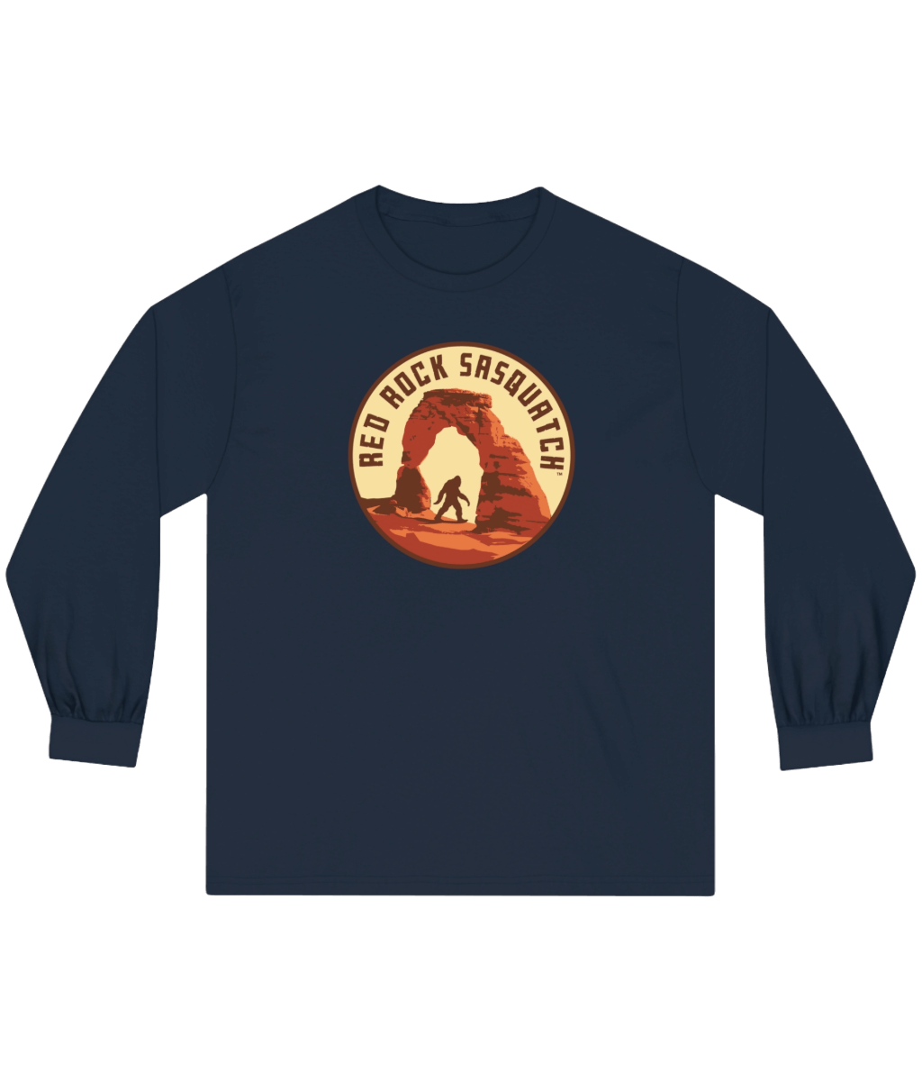 Navy long-sleeve Delicate Arch tee. Features a Sasquatch silhouette within the Delicate Arch formation.
