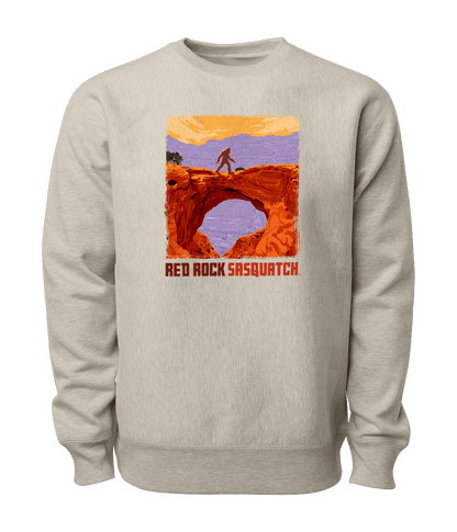 This oatmeal heather-colored Capitol Reef crewneck sweatshirt featuring a Sasquatch crossing Hickman Bridge. Perfect for exploring Utah's national parks.