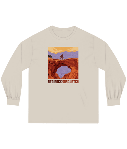 Sand-colored Capitol Reef Long-Sleeve Tee. Features a Sasquatch graphic on a natural bridge formation within Capitol Reef.
