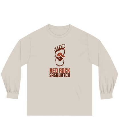 Sand-colored long-sleeve Red Rock Sasquatch tee. Features the Red Rock Sasquatch logo and text. A casual and earthy long-sleeve choice.