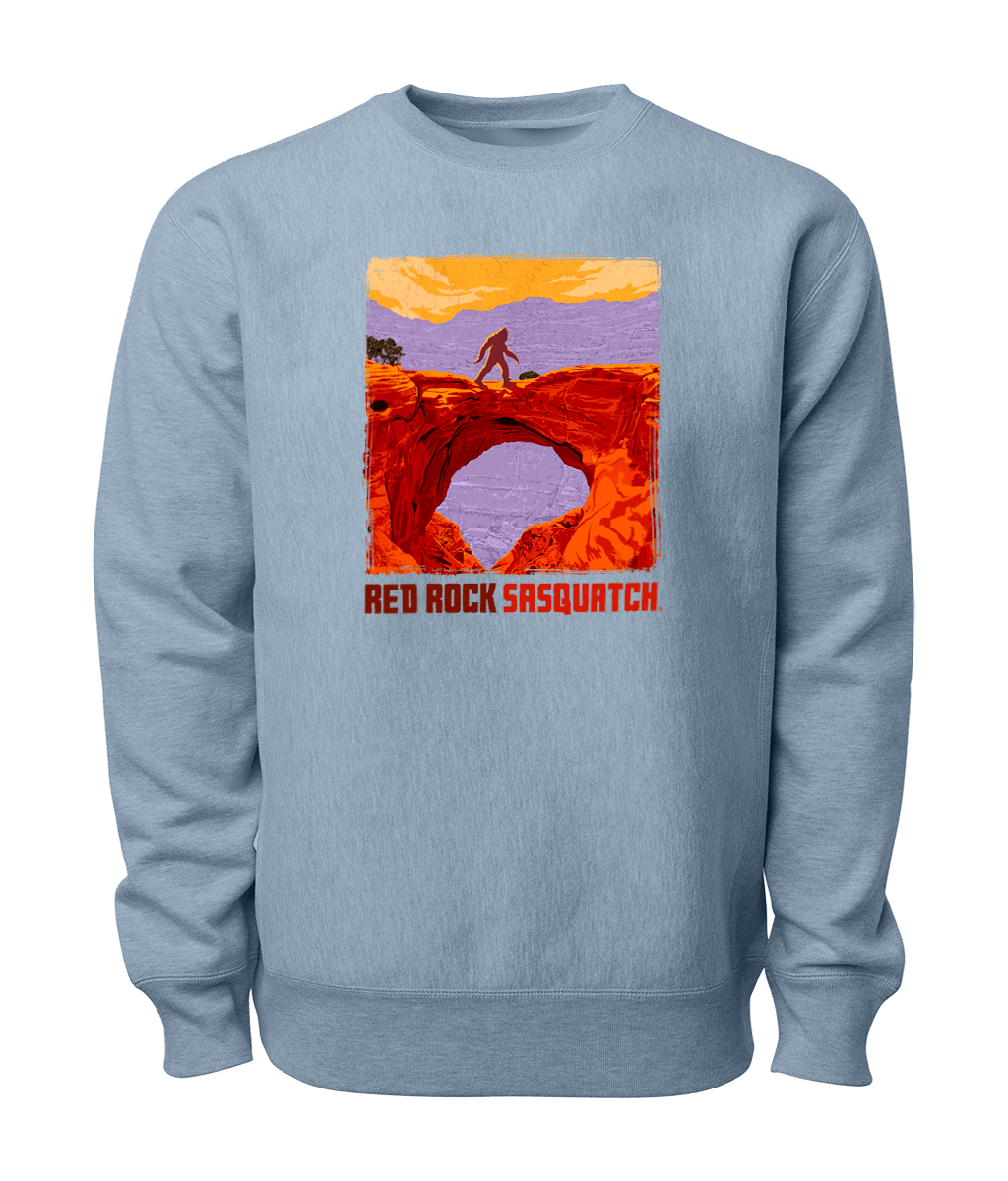 Embrace the beauty of Capitol Reef National Park with this stone blue crewneck sweatshirt featuring a Sasquatch design. Perfect for outdoor adventures and casual wear.