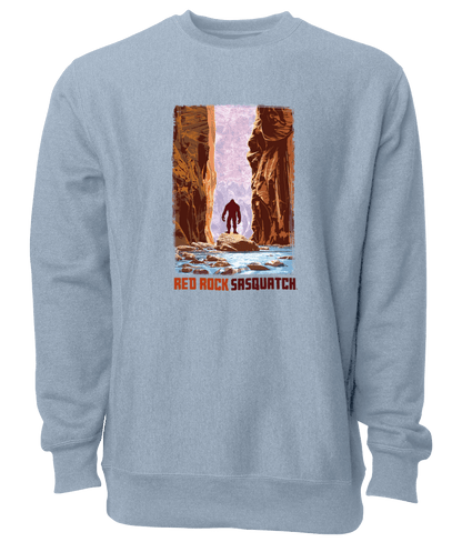 Embrace the adventurous spirit of Zion National Park with this stone blue crewneck sweatshirt featuring a Sasquatch in The Narrows.