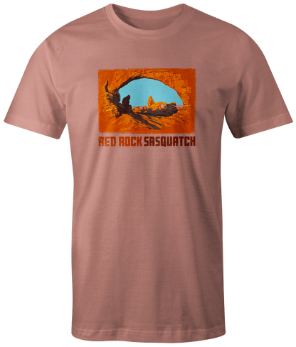 Terracotta short-sleeve t-shirt featuring a Sasquatch design at the famous Delicate Arch.