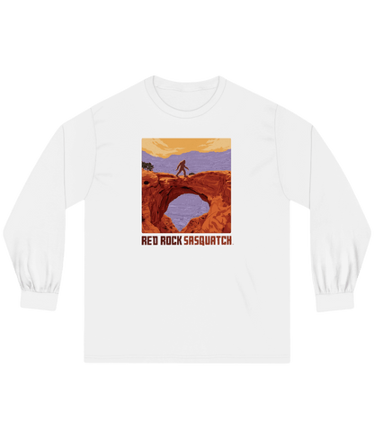 White Capitol Reef Long-Sleeve Tee. Displays a Sasquatch design at a scenic overlook in Capitol Reef.