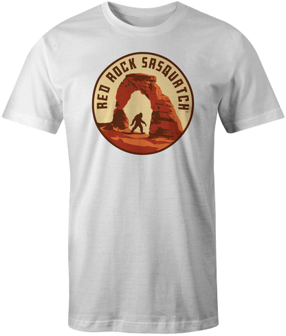White Icon Tee - Delicate Arch short-sleeve t-shirt. Showcases a circular design of Delicate Arch in Arches National Park with a Sasquatch.